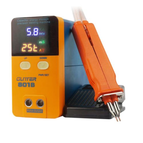 Orange and black welding machine with digital display on a white background